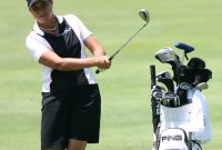 Sherri Steinhauer playing golf