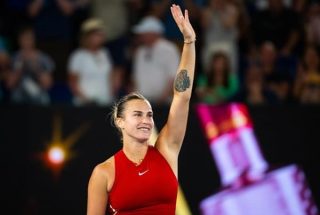 Tennis Star Aryna Sabalenka waiving to crowd after a match