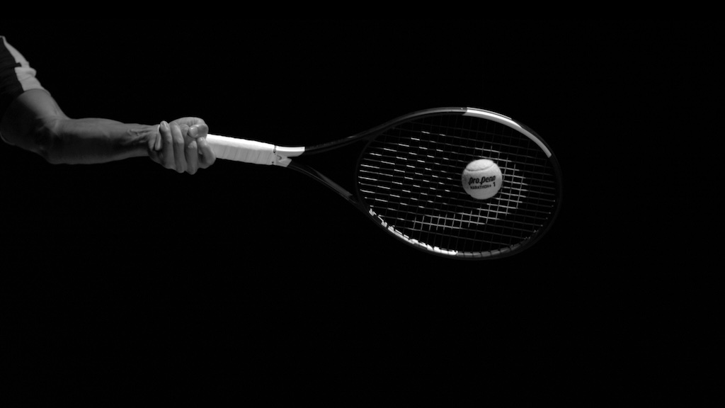 picture of new Pro Penn Marathon Plus ball hit by racquet