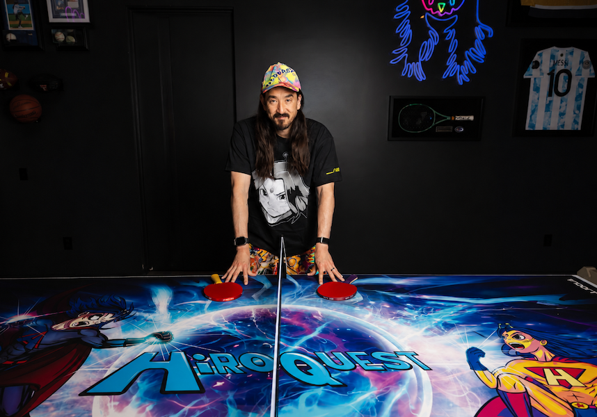 Steve Aoki with the limited-edition JOOLA x Steve Aoki HiROQUEST Infinity Carbon table tennis rackets, available October 6, 2026, exclusively at JOOLA.com.